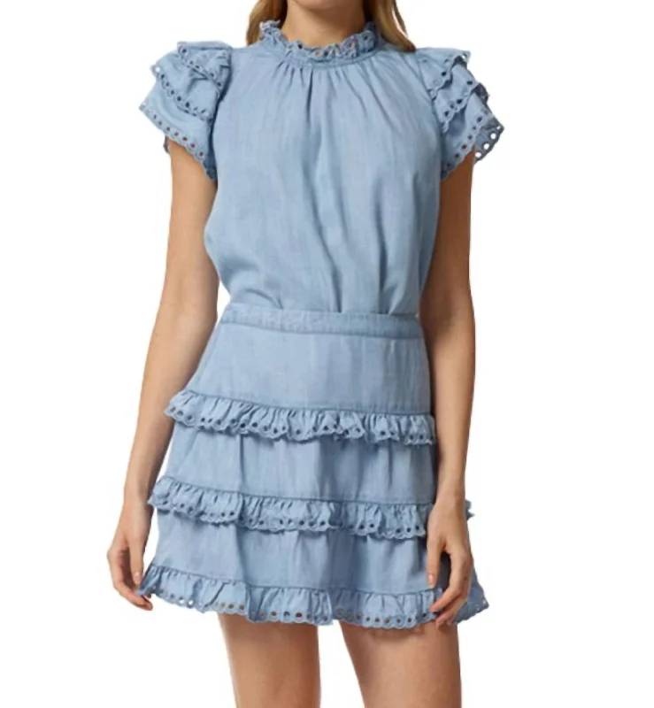 Mini-length bodycon dress for women with playful cut and fun style -Eyelet Trimmed Tiered Mini Skirt In Denim