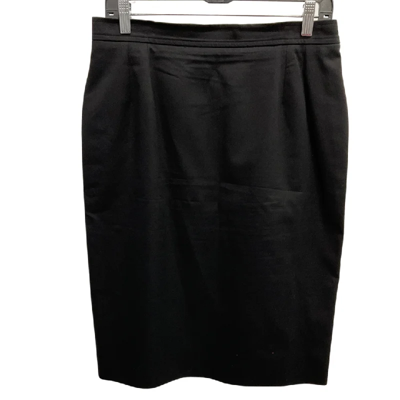 Wrap skirts for adjustable stylish fit -Skirt Luxury Designer By Yves Saint Laurent In Black, Size: 12